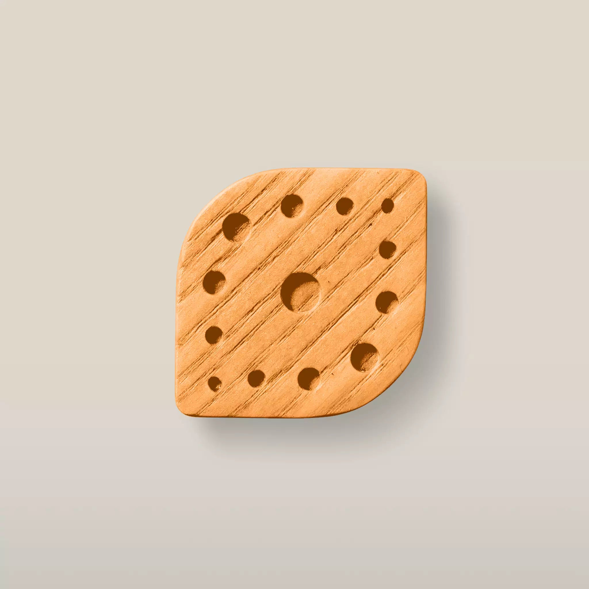 Solid ash constellation cabinet knob in the Orange finish, front view