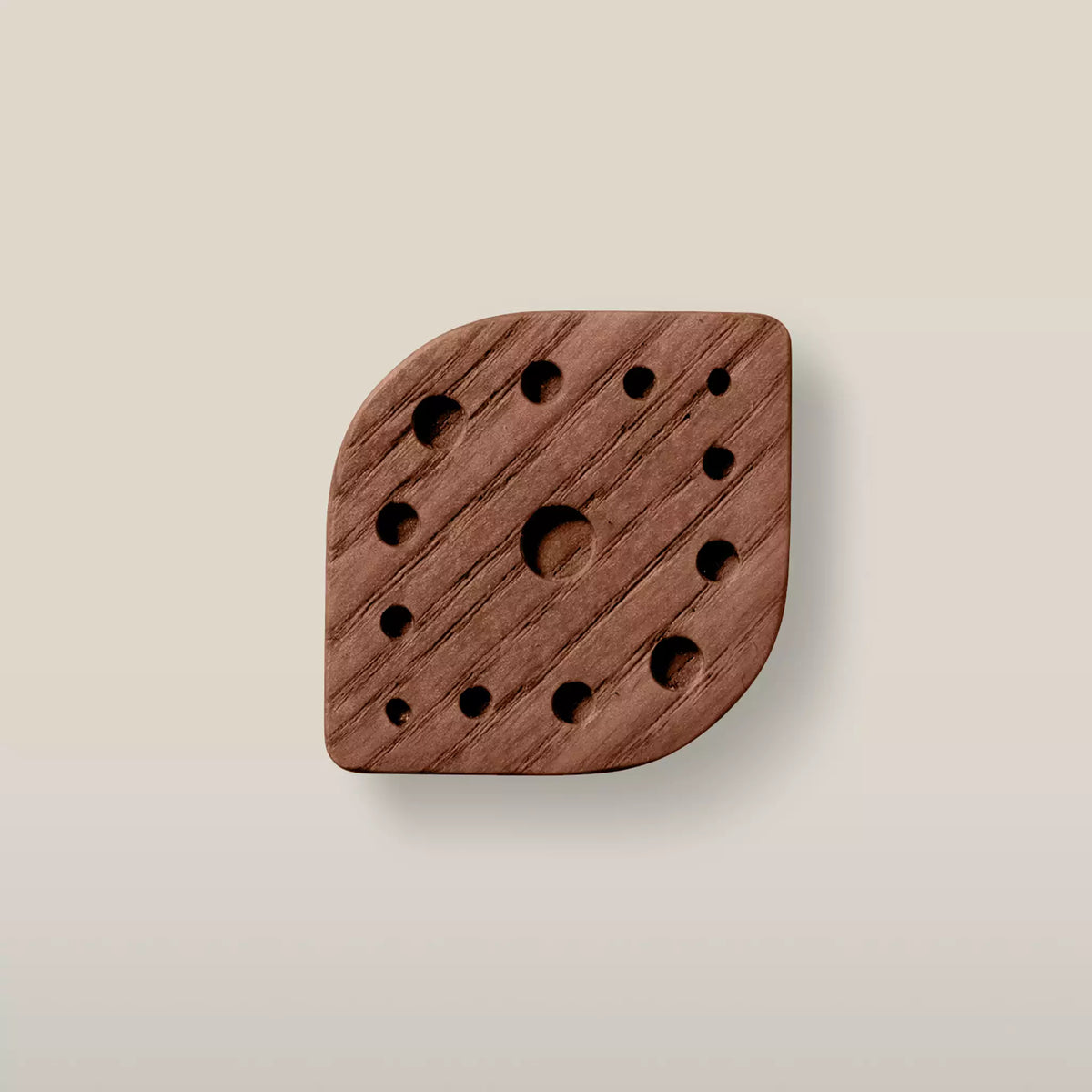 Solid ash constellation cabinet knob in the Walnut finish, front view