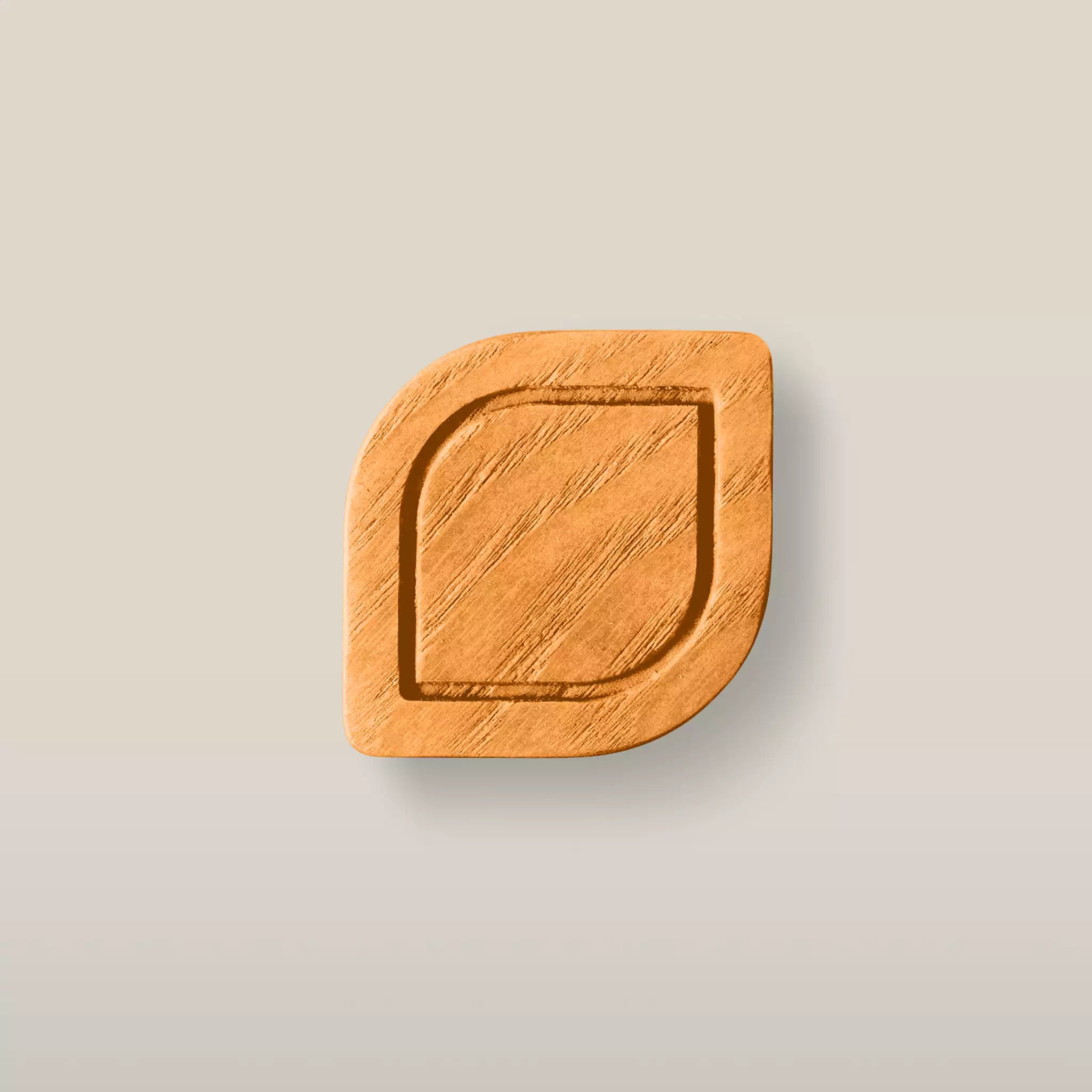 Solid ash framed leaf cabinet knob in the Orange finish, front view