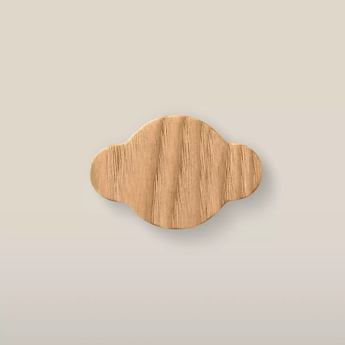 Cloud-shaped ash cabinet knob in Caffe Latte, a mid brown