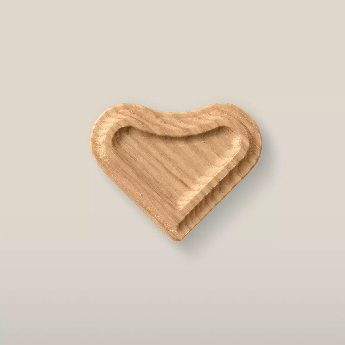 Solid ash heart cabinet knob in the Caffe Latte finish, front view
