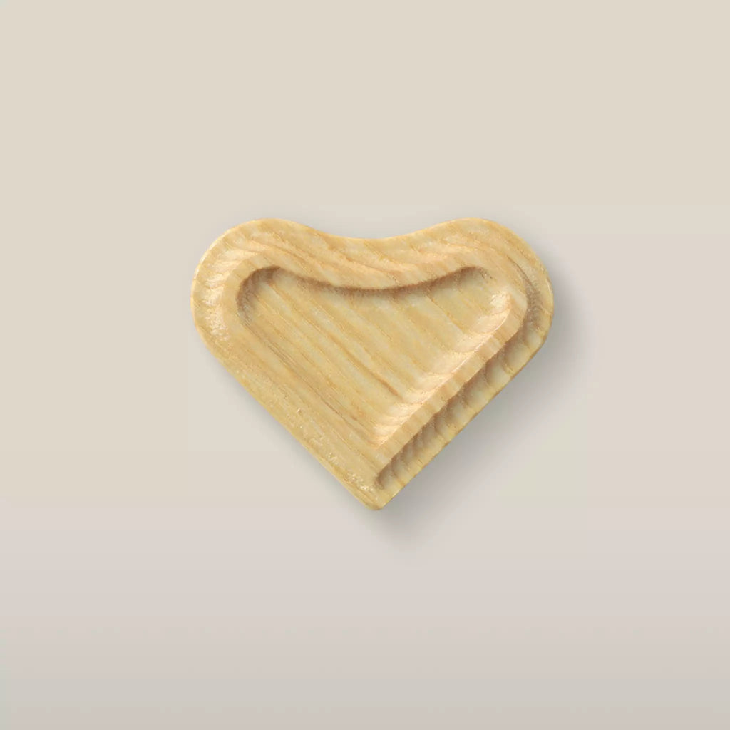 Solid ash heart cabinet knob in the Unfinished finish, front view