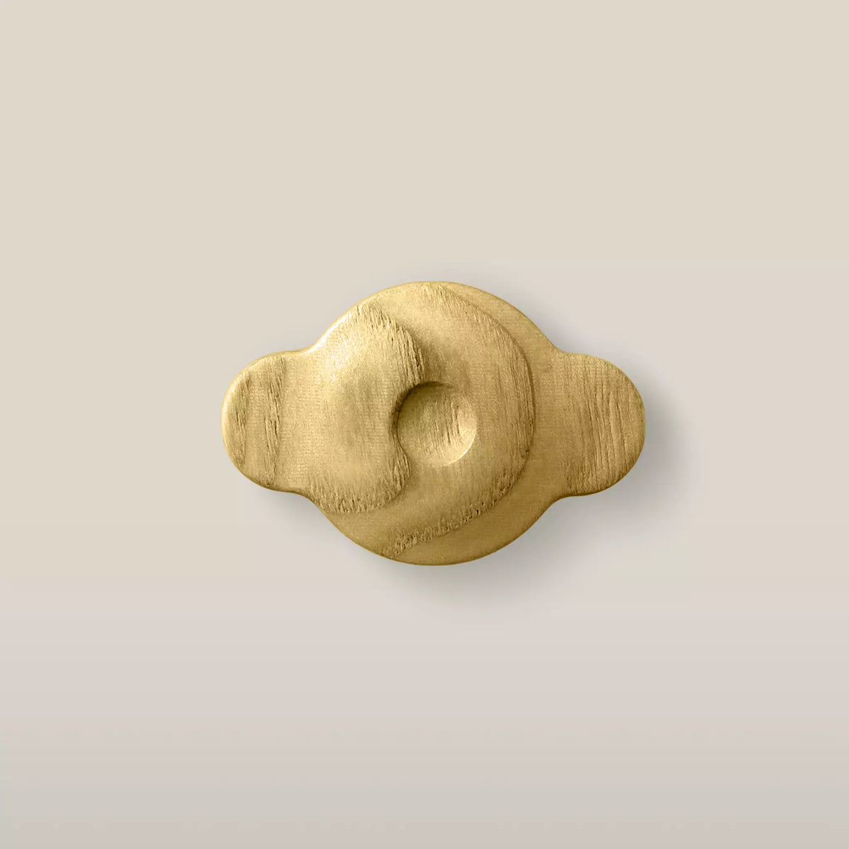 Solid ash swirl cabinet knob in the Cream finish, front view