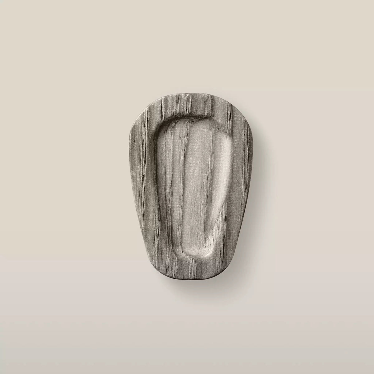 Solid ash teardrop cabinet knob in the Dark Gray finish, front view