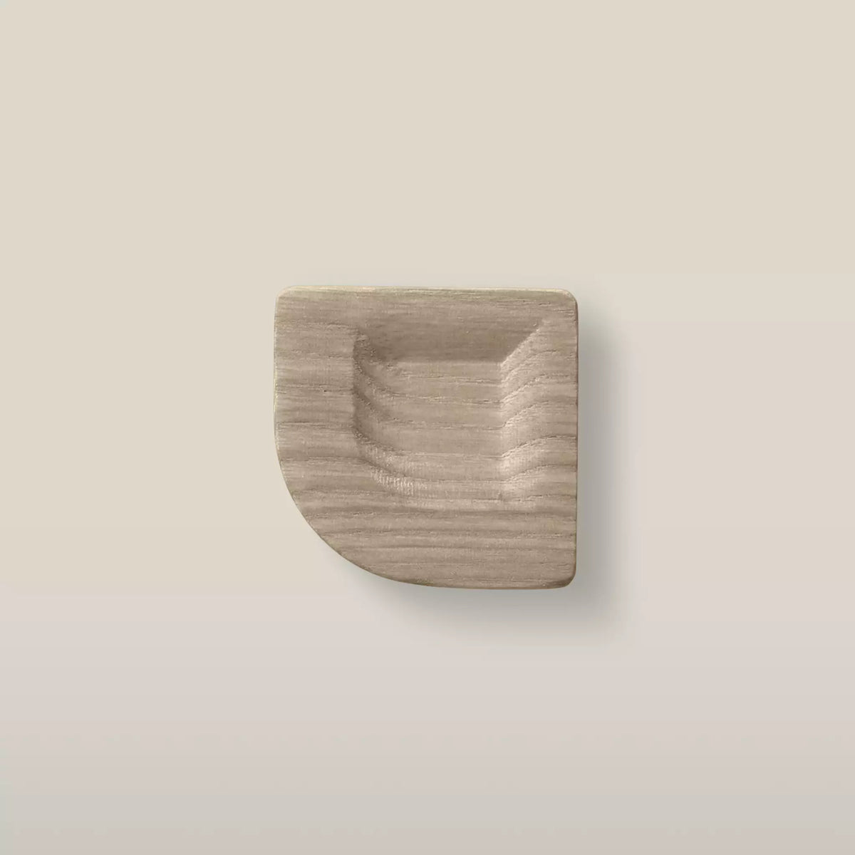 Solid ash scooped square cabinet knob in the Cappuccino finish, front view