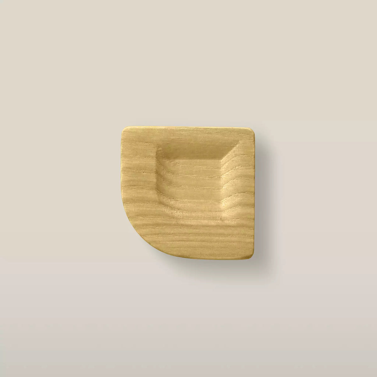 Solid ash scooped square cabinet knob in the Cream finish, front view