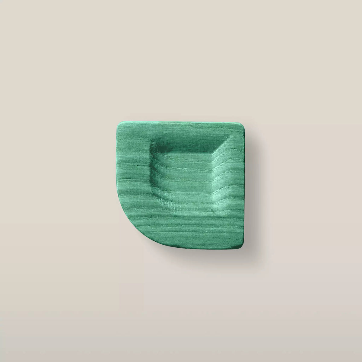 Solid ash scooped square cabinet knob in the Green finish, front view