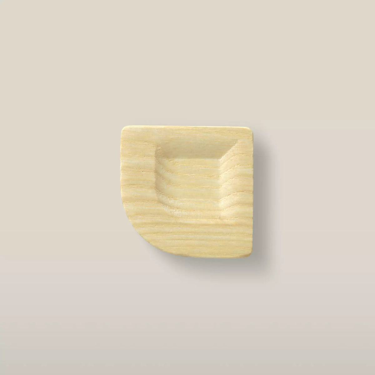 Solid ash scooped square cabinet knob in the Latte finish, front view