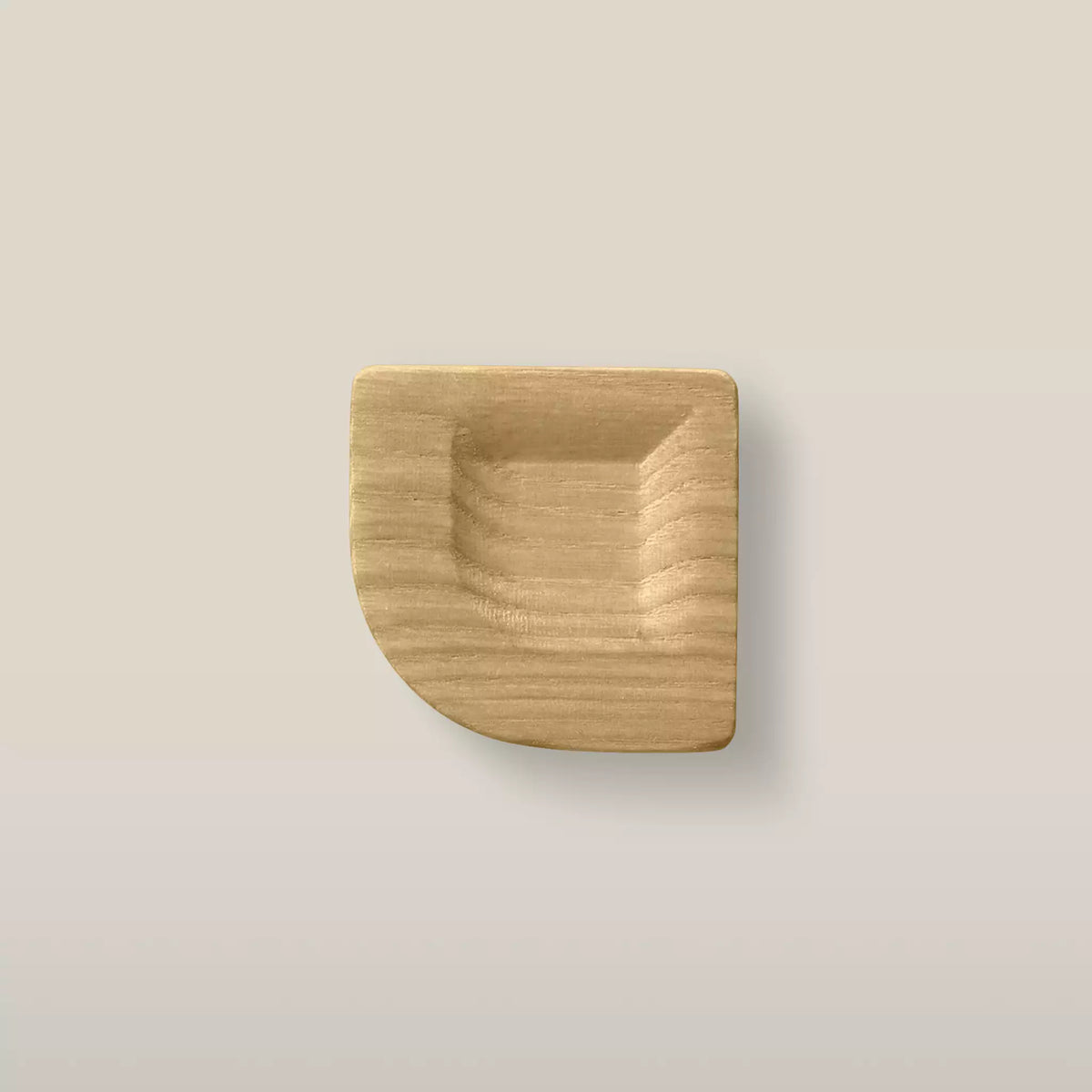 Solid ash scooped square cabinet knob in the Oiled finish, front view