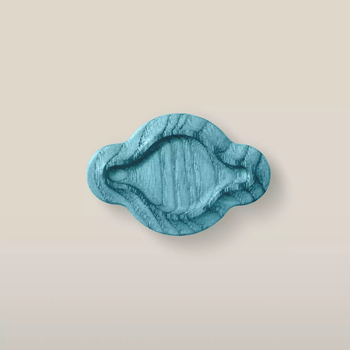 Solid ash scalloped oval cabinet knob in the Blue finish, front view