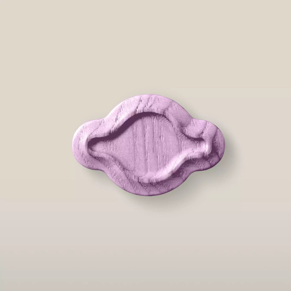 Solid ash scalloped oval cabinet knob in the Purple finish, front view