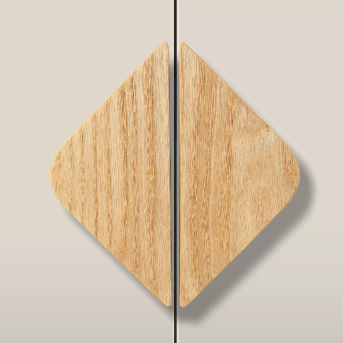 Solid ash diamond cabinet pull in the Unfinished finish, fitted across two doors