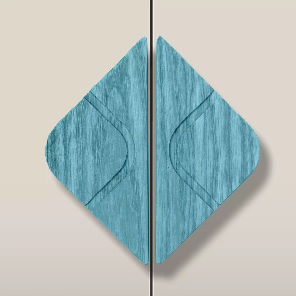 Solid ash leaf diamond cabinet pull in the Blue finish, fitted across two doors