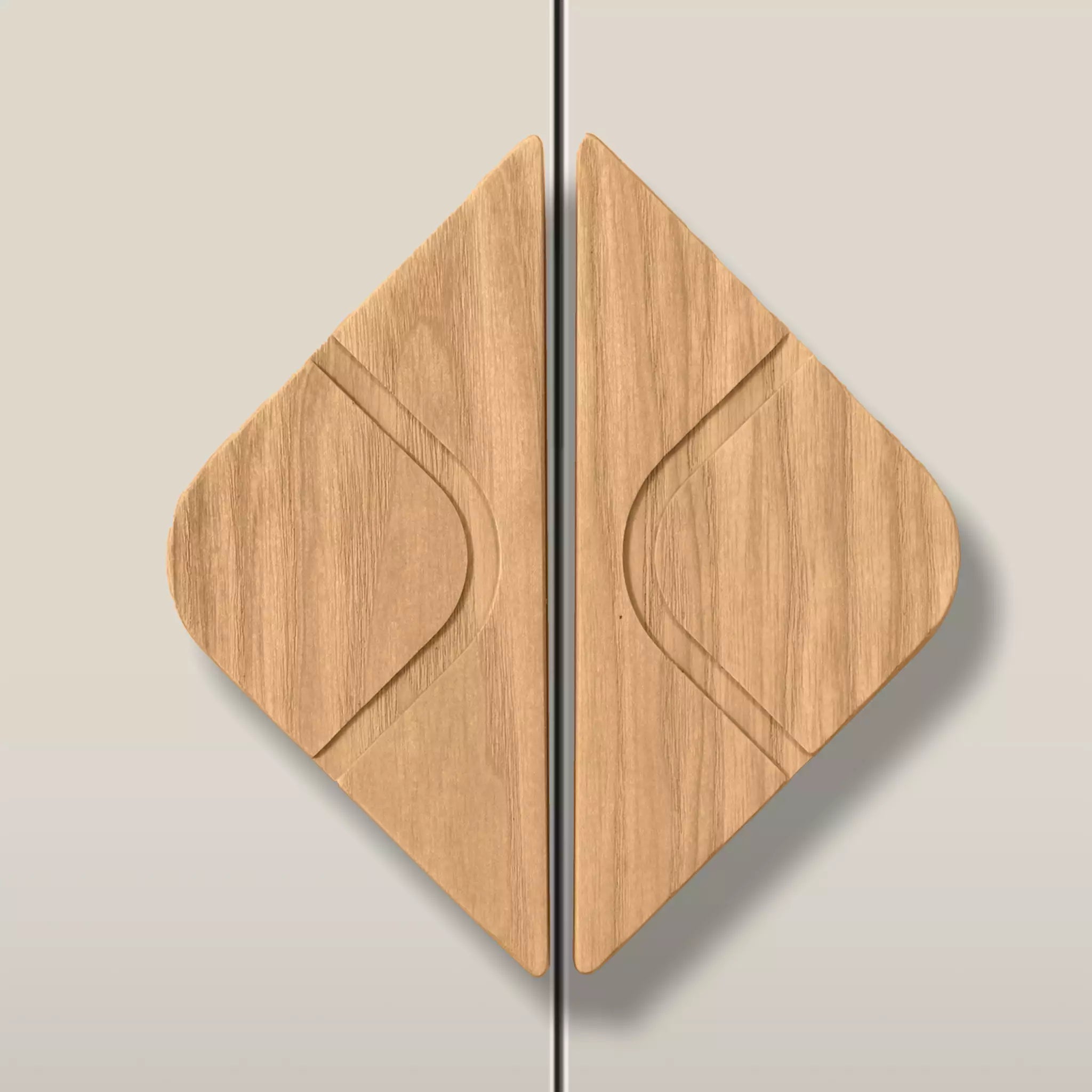 Solid ash leaf diamond cabinet pull in the Caffe Latte finish, fitted across two doors