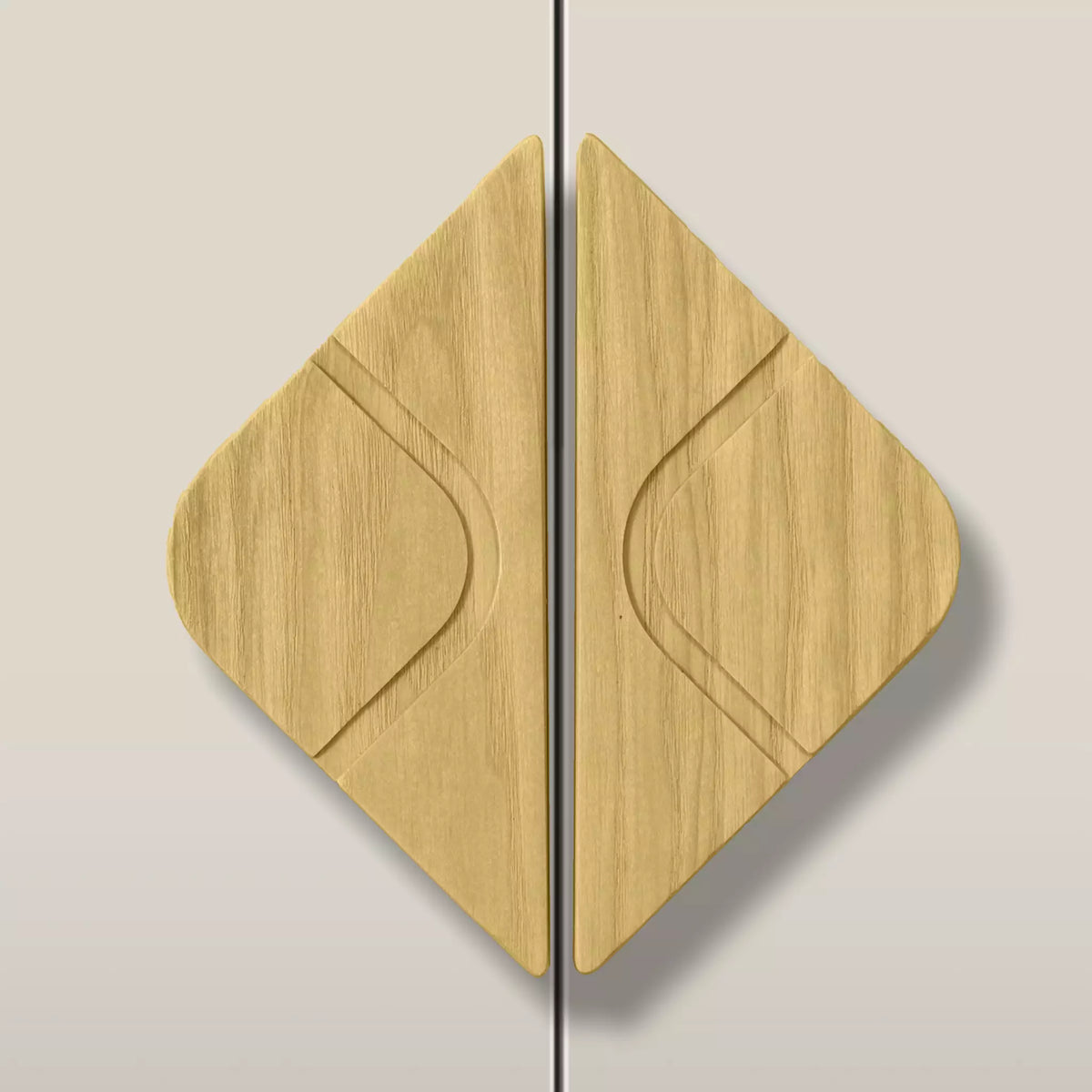 Solid ash leaf diamond cabinet pull in the Cream finish, fitted across two doors