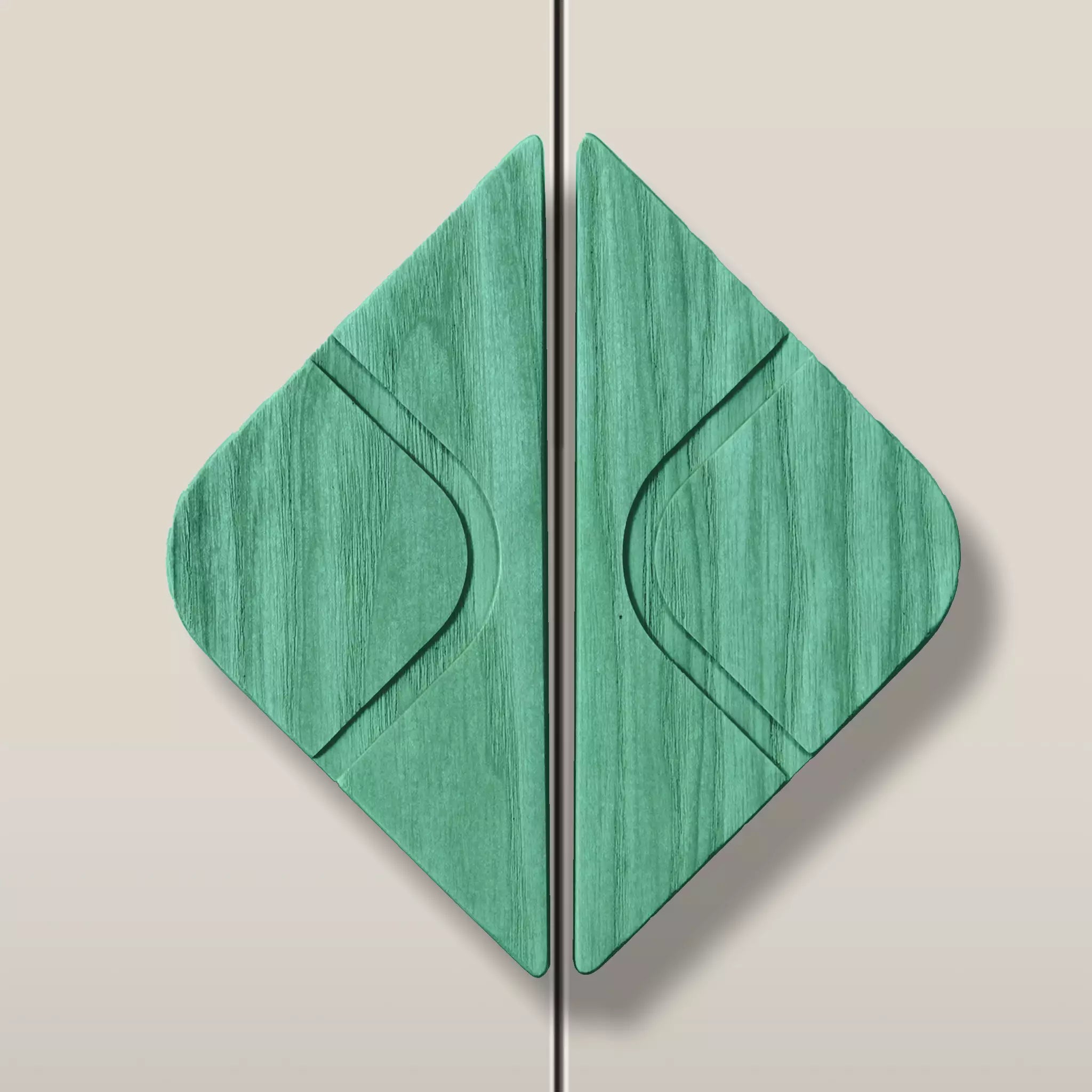 Solid ash leaf diamond cabinet pull in the Green finish, fitted across two doors