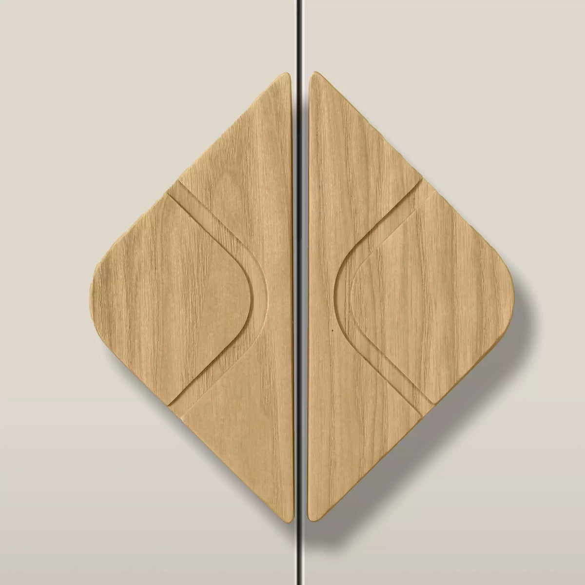 Solid ash leaf diamond cabinet pull in the Oiled finish, fitted across two doors