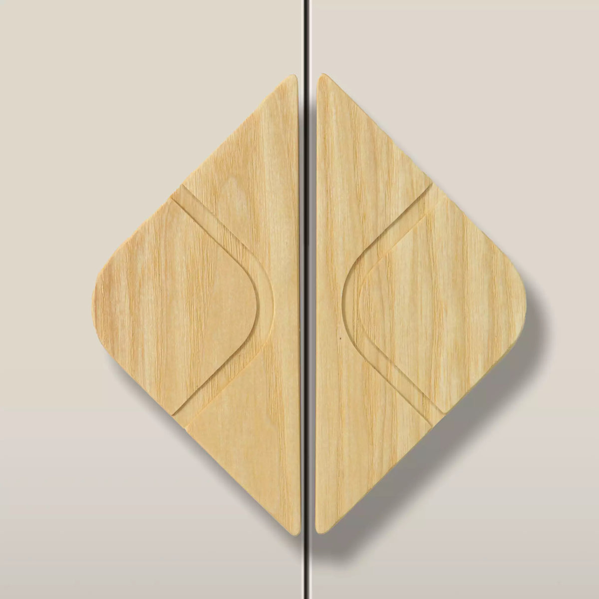 Solid ash leaf diamond cabinet pull in the Unfinished finish, fitted across two doors
