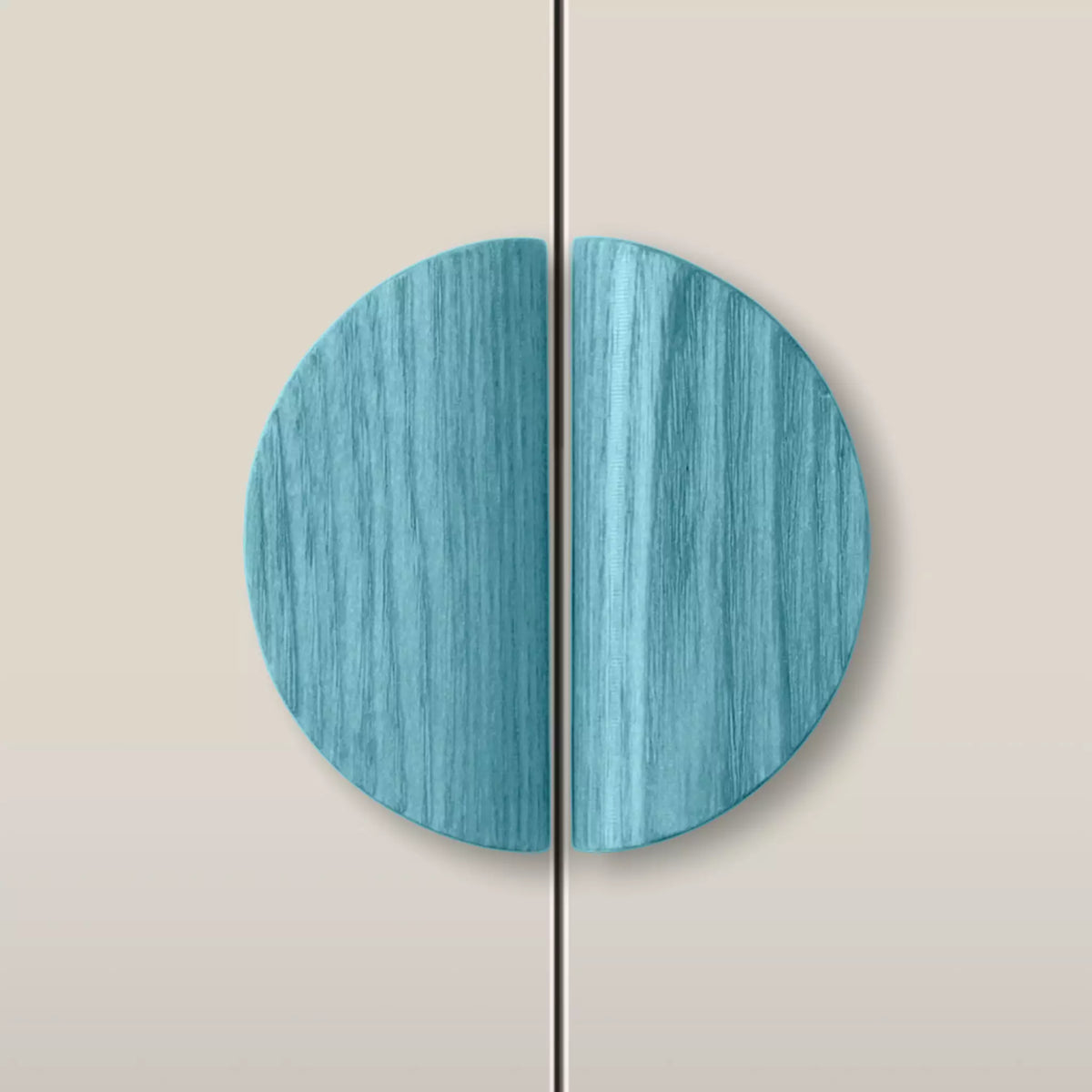 Solid ash dome cabinet pull in the Blue finish, fitted across two doors
