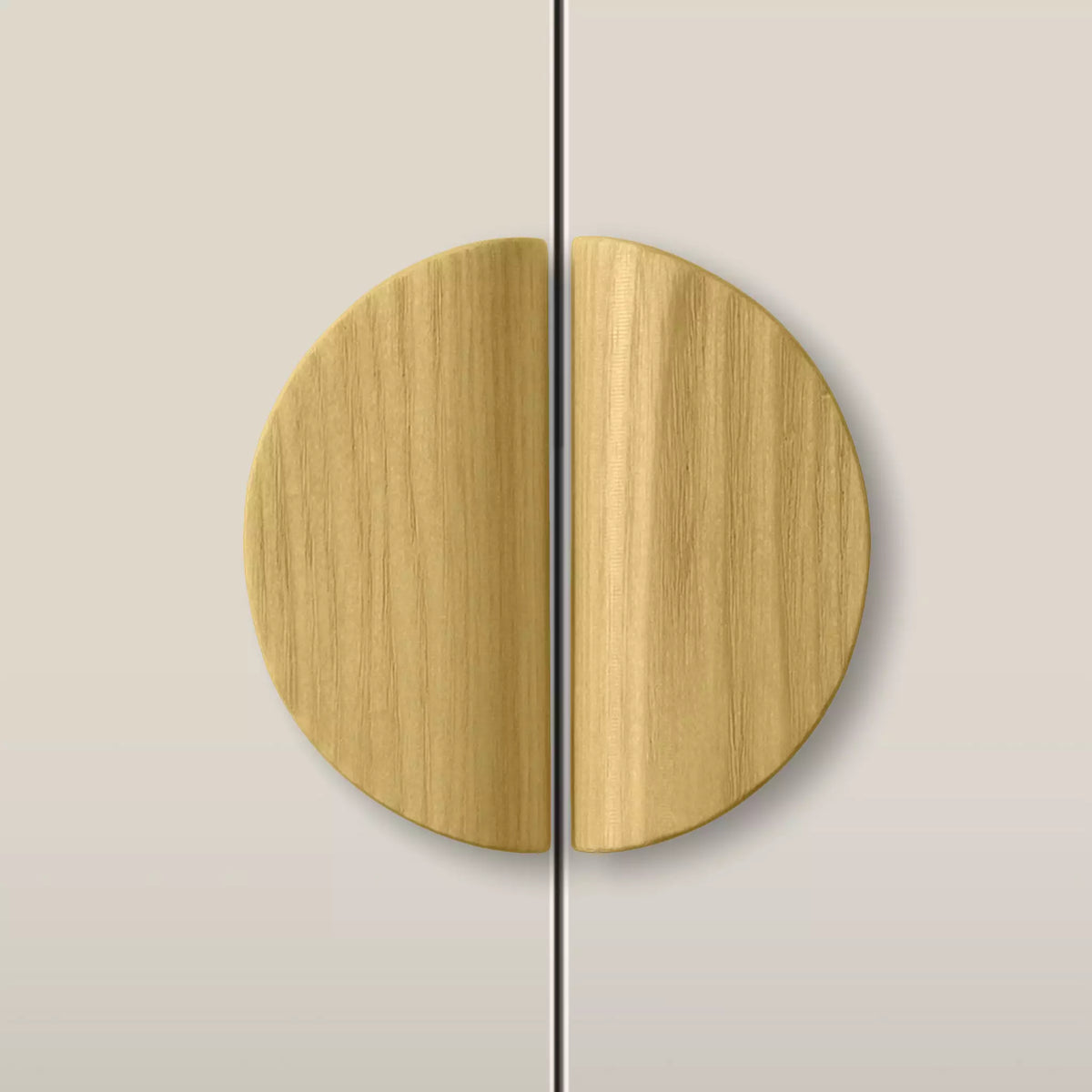 Solid ash dome cabinet pull in the Cream finish, fitted across two doors