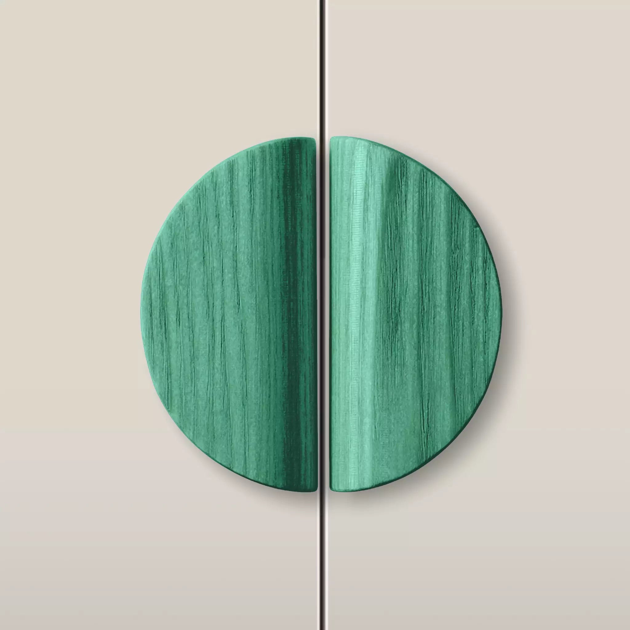 Solid ash dome cabinet pull in the Green finish, fitted across two doors