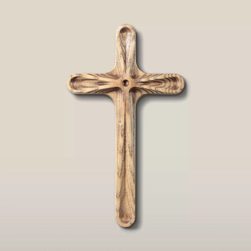 The cross in the oiled finish, the ash kept pale but the grain deepened by the oil
